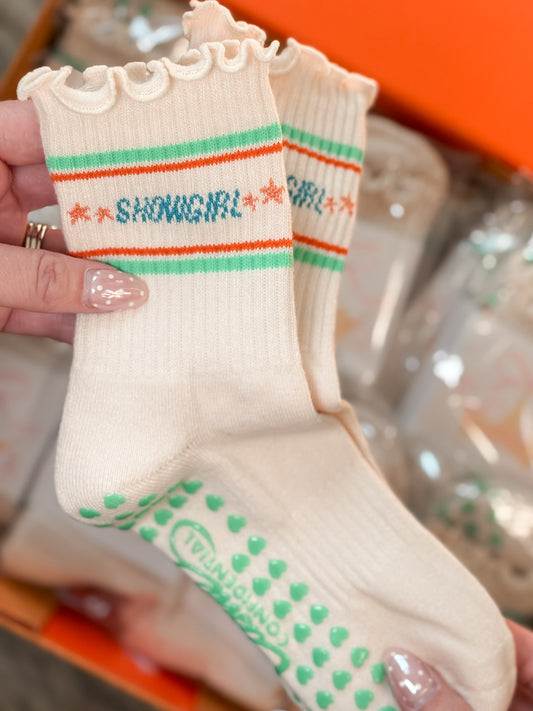 cream showgirl grip socks flat lay